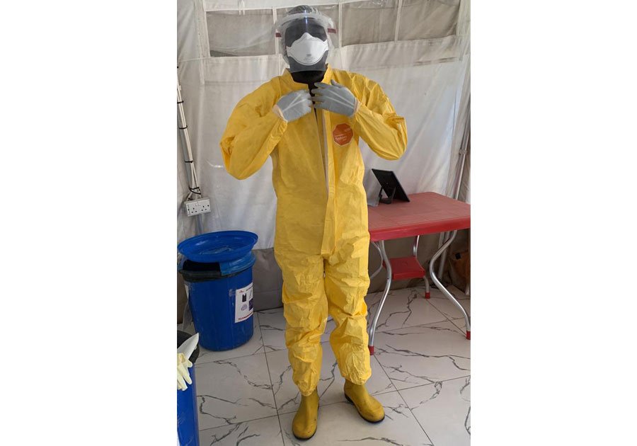 Reuben demonstrating donning and doffing complete PPE to staff in preparation for the outbreak of Lassa fever in Nigeria. Reuben demonstrating donning and doffing complete PPE to staff in preparation for the outbreak of Lassa fever in Nigeria.