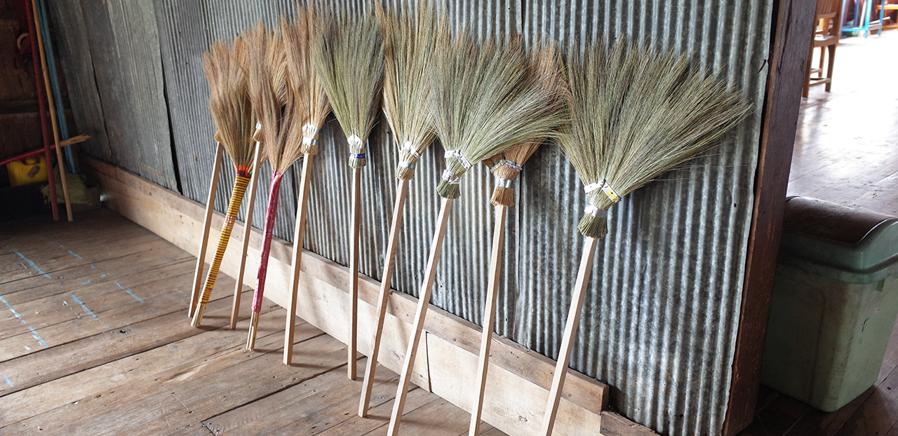 Brooms against a wall