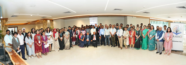 a picture of a people in a conference in india