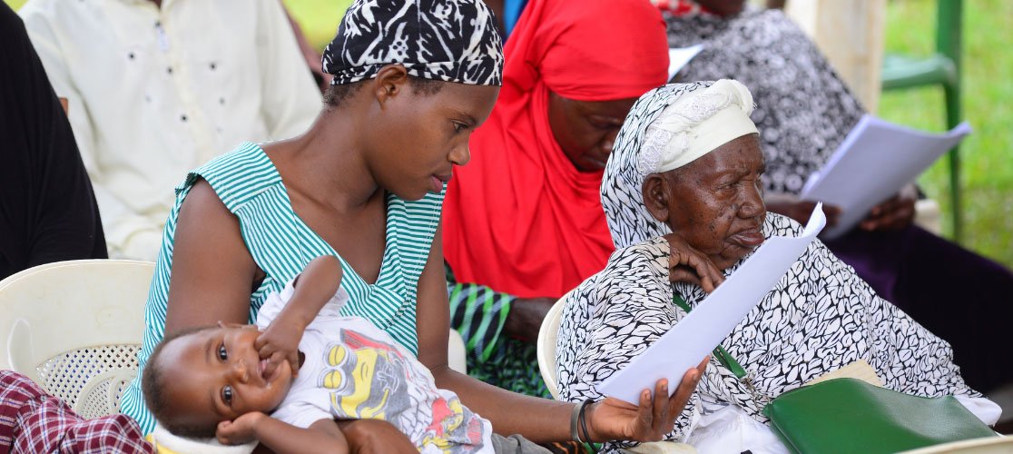 Research participicants reading consent forms