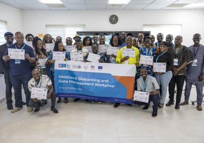 A group picture showing people holding certificates