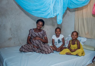 Elizabeth George Kepha with children. Credit: Malaria No More 