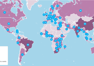 A world map shaded in various colours of purple depicting the number of research grants located in each country