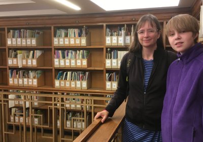 Melissa Andrew with her son in the LSHTM library