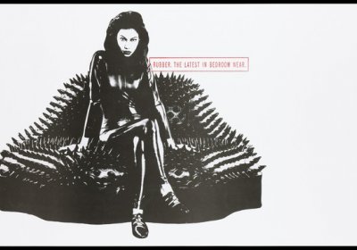 Attribution: A woman dressed in a rubber catsuit sitting on a spiky leather sofa in the shape of lips representing an AIDS prevention advertisement for safe sex and condoms by Action for AIDS, sponsored by Durex condoms. Colour lithograph, ca. 1995. Credit: Wellcome Collection. CC BY-NC