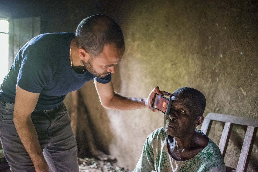 aption: Andrew Bastawrous uses the peek device to examine a Kenyan woman suffering from blindness. Credit: Rolex/Joan Bardeletti