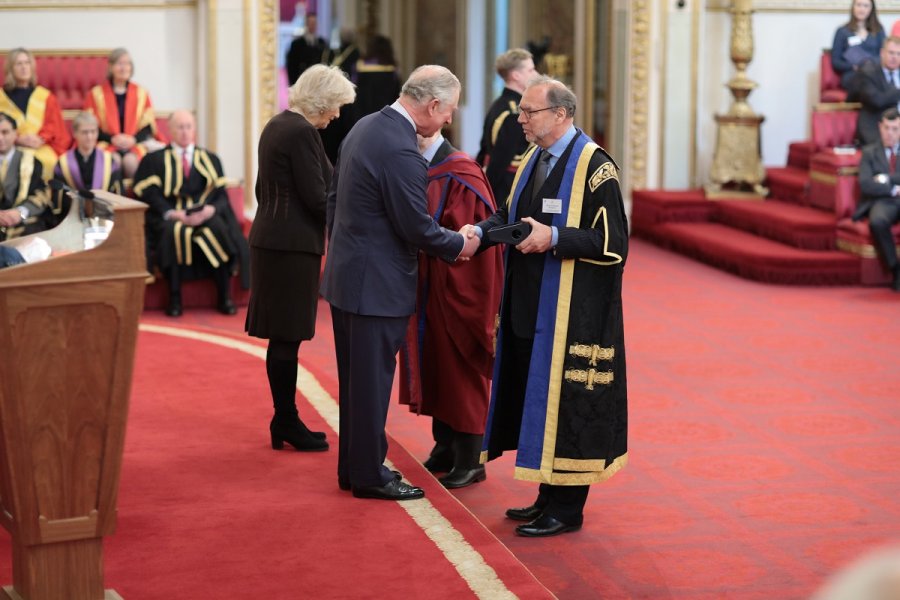 Caption: Peter Piot accepting Queen&#039;s Anniversary Prize. Credit: BCA Film/LSHTM