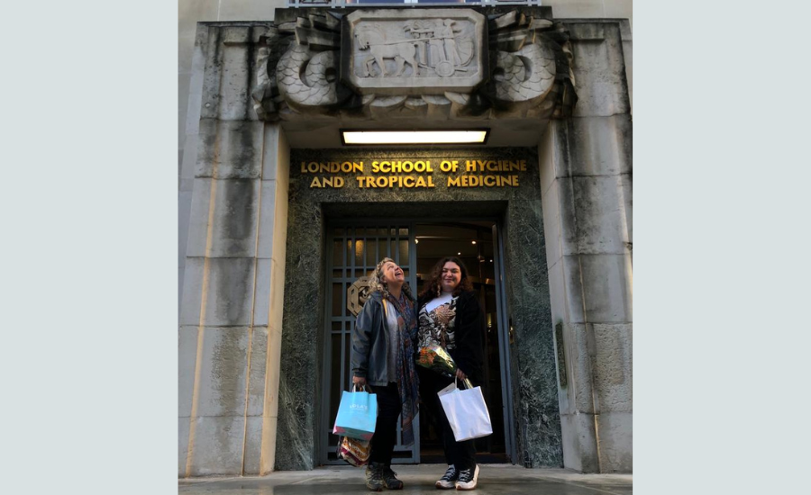 Millie and her mum outside the front entrance of LSHTM