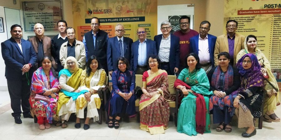 Group of alumni based in Dhaka, Bangladesh posing for a picture at their meeting