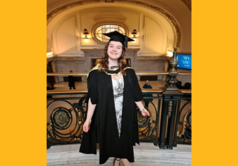 Dr Charlotte Wilson wearing a graduation cap and robe 