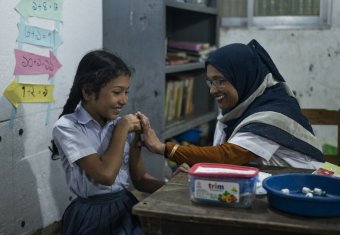 A girl being given the HPV vaccine in Bangladesh.