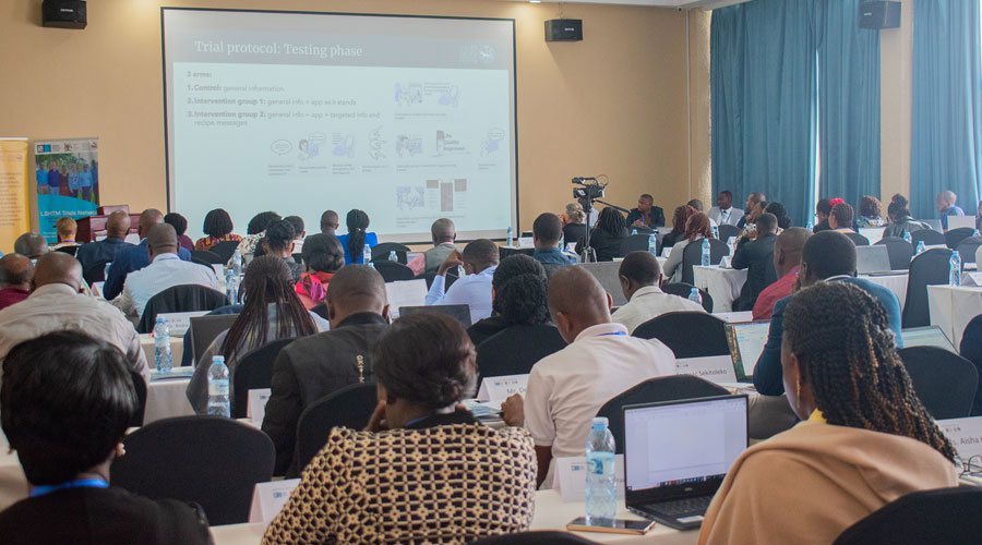 Members watching a presentation at LSHTM Trials Network Trials Day